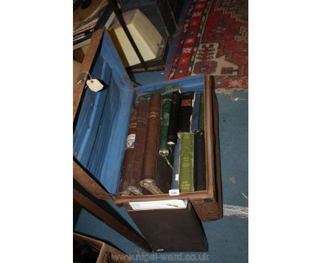 A metal trunk containing ledgers, old stamp albums, etc