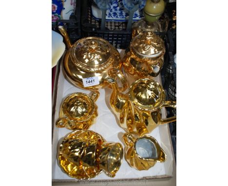 A part Japanese gilt china Teaset and a Royal Worcester gilt Teapot and Coffee Pot 