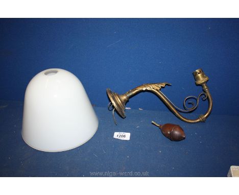 A Brass wall Light and a white glass shade