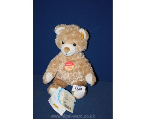 A small, contemporary Steiff Teddy Bear