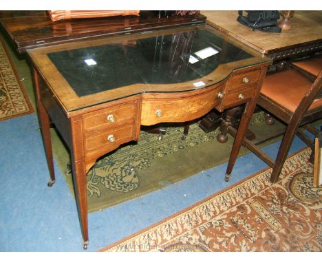 An elegant Edwardian Rosewood writing Table with inset leather top (protected by glass cover), strung border, strung edge and