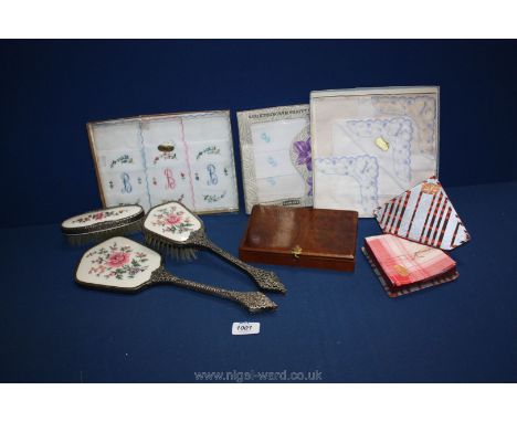 A ''Regent of London'' dressing Tables set with stylised decoration including clothes and hair brushes (with removable brushe