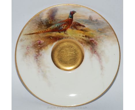 A small Royal Worcester Saucer painted with scene of pheasant, signed Stinton