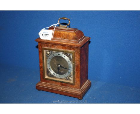 A small Georgian style Bracket Clock by W.M. Burford and Son Ltd, Eastbourne and Eypter (retailer), clock by Elliott. 8 1/2" 