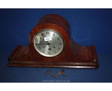 A Napoleon Hat mantle Clock with key and pendulum, as found