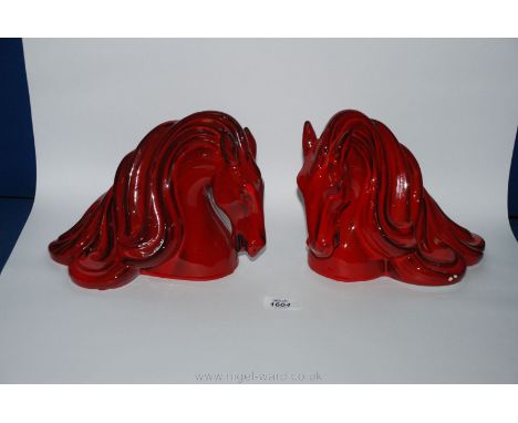 A stunning pair of red ceramic vintage Bookends, Italian made horse heads.