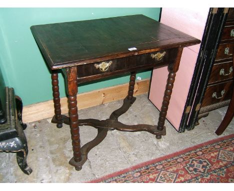 An unusual mid 18th c. Mahogany and Oak Side Table, having three plank moulded edge cleated front top, single frieze drawer w