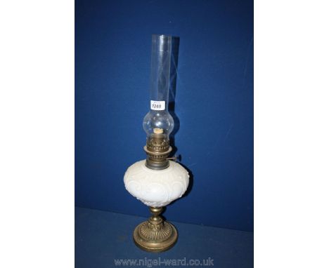 A vintage French Oil Lamp complete with chimney.