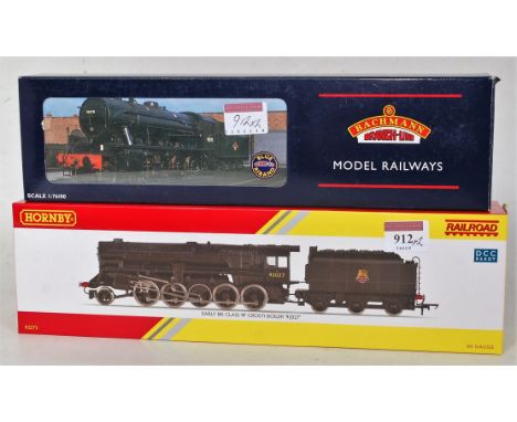 A Hornby R3273 Railroad series BR black class 9F engine and tender No. 94027 fitted with Crosti boiler (M-BNM) together with 