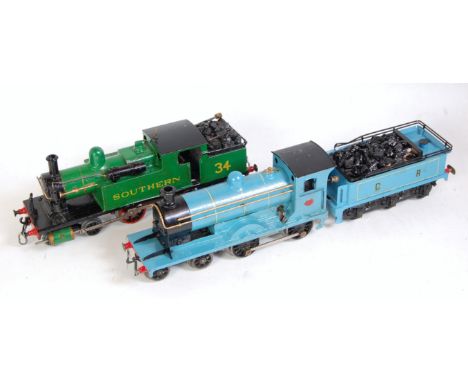 Two clockwork locomotives, a 4-4-2 radial type tank engine as Southern No. 34 (F-G), and a 4-4-0 engine and tender Caledonian
