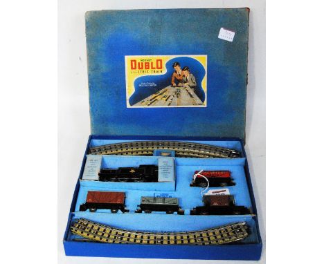 A Hornby Dublo EDG17 train set containing gloss black EDL17 tank engine (VG), 4 wagons (G) track oval (G) box lid tape repair