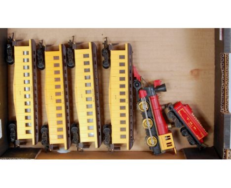 Triang TC series 'Davy Crockett' engine and tender, some rusting to coupling rods (G) and 4 yellow smoking cars (F-G)
