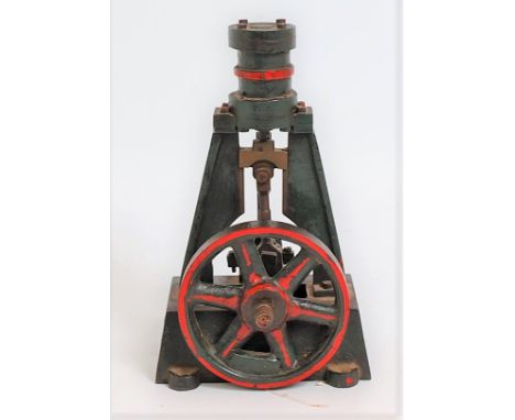A mid-20th century model of a vertical live steam engine comprising of a single cylinder mounted on A frames with slip eccent