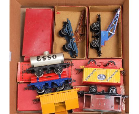Seven Hornby wagons - No. 50 goods brake (F) incorrect (BP), 1955 Portland Cement, yellow body (G-BVG), 1950-3 Esso silver ta