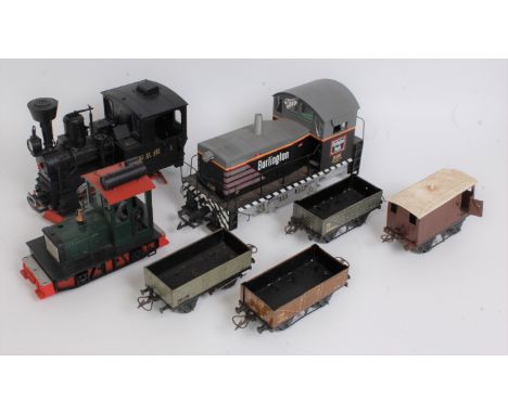 A collection of various G-gauge and 0-gauge loose locomotives and rolling stock to include a home built 040 G-scale dockyard 