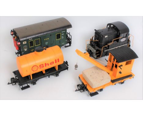 Four various loose Lehman and LGB Continental and American Outline G-Scale locomotives and rolling stock, to include a New Yo