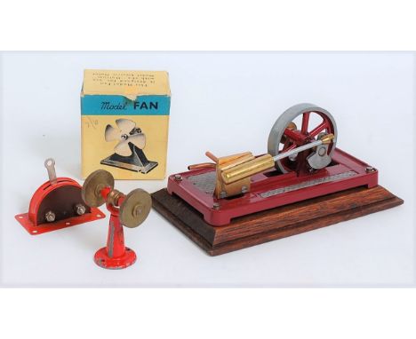 A collection of various live steam engines and components to include a miniature live steam single cylinder horizontal engine