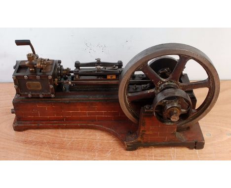 A very well made circa 1880 model of a live steam stationary horizontal mill engine, comprising of large single cylinder fitt