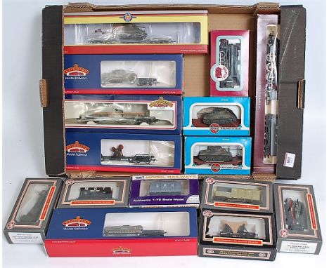 Tray containing items with a WWII theme Hornby class 8F engine and tender grey WD300 (G-BFG), a Dapol WD 0-6-0 tank engine 'W