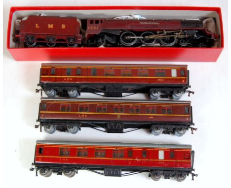 A Hornby Dublo 3-rail 'Duchess of Atholl' engine and tender together with 3 LMS coaches (F-G)