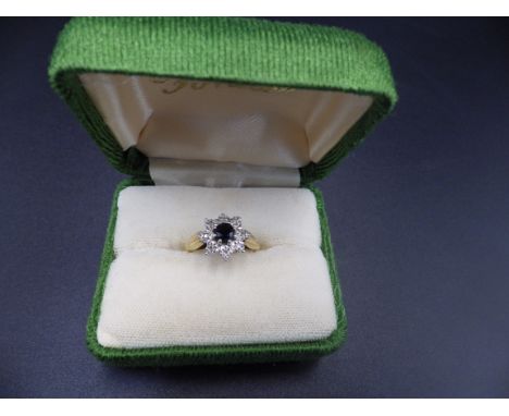 18ct hallmarked gold, sapphire and diamond 'snowflake' ring, size M, 3.52g total weight.