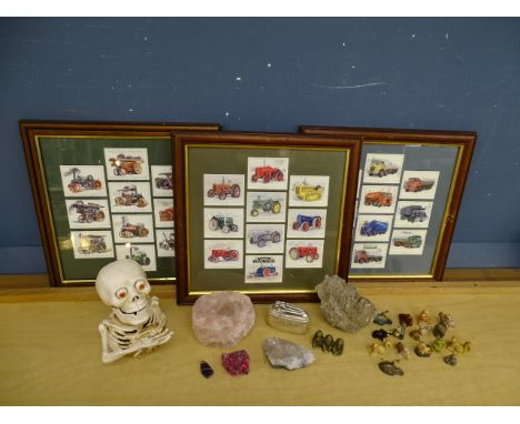 Collectors lot to include cast iron skeleton money bank, crystals, Wade Whimsies, Ronson table lighter and framed cigarette c