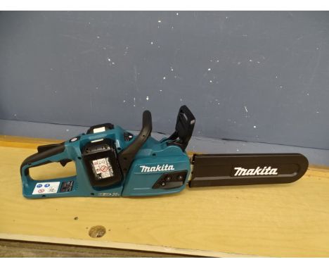 Makita DUC355 twin 18v cordless lithium chainsaw with 2 18v batteries all in working order with fully charged batteries (no c