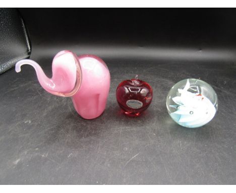 Wedgwood glass apple, Caithness elephant and Langham glass paperweight with birds
