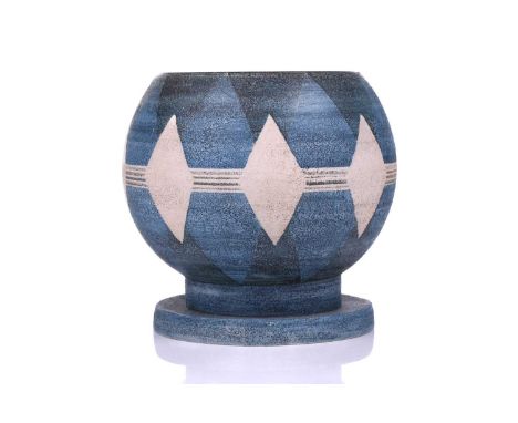 An unusual 1970s Troika globe form art pottery vase, decorated with texture diamond-shaped panels in tones of ivory and blue,