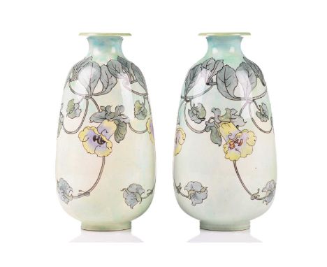 Agnes Baigent (active 1901-1910) for Doulton Lambeth; a pair of Art Nouveau faience vases of inverted baluster form with ever