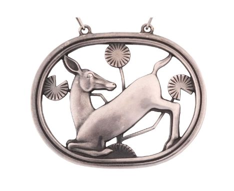 Georg Jensen; a 925 sterling silver pendant, openwork design of a kneeling deer and flowers, attached to a cable chain and to