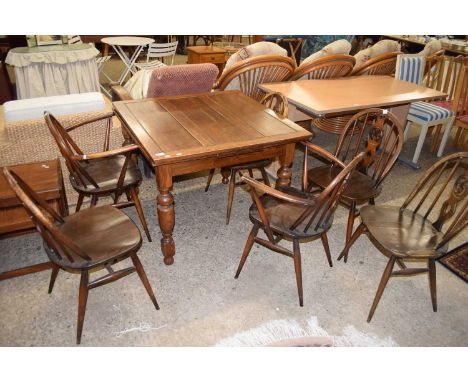 SET OF SIX DARK ERCOL FLEUR DE LIS BACKED DINING CHAIRS TOGETHER WITH A MID-CENTURY DRAW LEAF DINING TABLE (7)