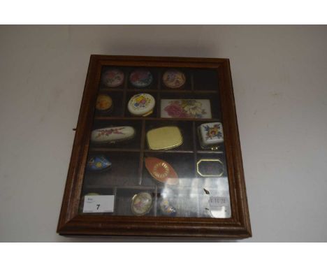 SMALL DISPLAY CABINET CONTAINING VARIOUS ENAMEL AND OTHER DECORATED PILL BOXES