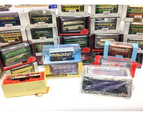 A Box Containing a Collection of boxed EFEs. Corgi and CSM Buses.