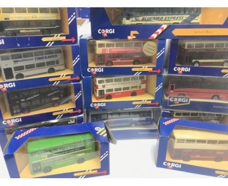 A collection of Boxed Corgi Buses Including Metro bus. Plaxton Coach and Volvo Bus.