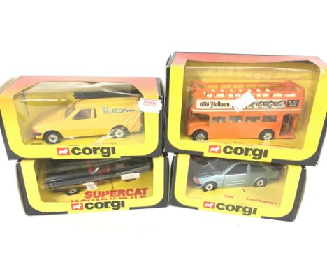 4 Boxed Corgi Vehicles including a Supercat Jaguar X-JS-H.E. #314. A Ford Escort #499. A Routemaster #469 and A Ford Escort #