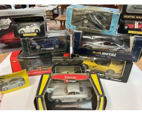 A Box Containing Various Boxed Diecast Including Burgos. Revell Corgi Etc. Boxes are Worn.