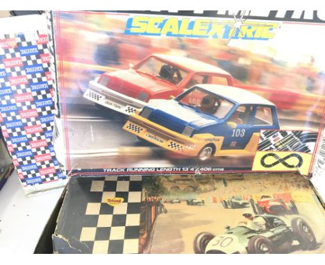 A Collection of Scalextric including Mighty Metro Set. Spare Track Etc.