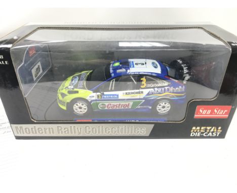 A Boxed Sun Star Ford Focus WRC 1:18 Scale.