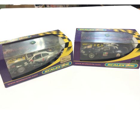2 X Boxed Scalextric Vehicles. A Jaguar XKRS Rocksports #C2711. A Maserati MC12 #C2630.