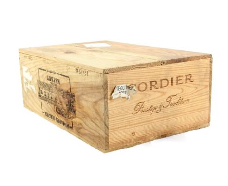 Updated description: Twelve bottles of Chateau Meyney, Saint Estephe 1997 vintage red wine, in opened wooden case