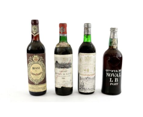 Four bottles to include a bottle of Chateau Paveil de Luze 1966 vintage red wine, a bottle of Marquis de Riscal Elciego 1971 