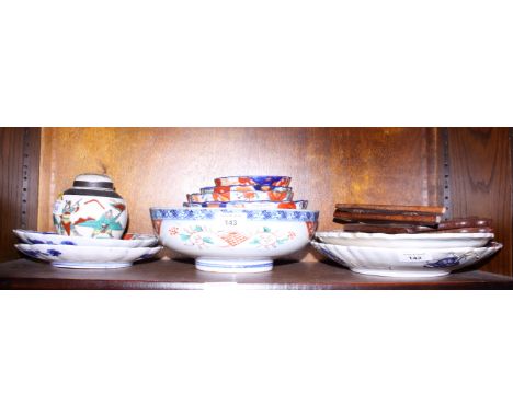 Three Imari bowls, two Imari plates, two lobed oval dishes and other Oriental ceramics