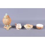 A Grainger and Co reticulated pot pourri vase and cover, on triform base, 6" high (damage to