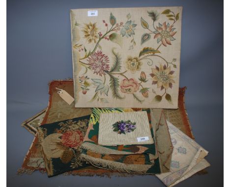A tapestry panel of crewel and a woolwork panel of 16th century design, unframed