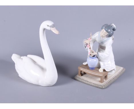 A Lladro porcelain figure, "Oriental Girl", together with a Lladro porcelain model, "Graceful Swan"