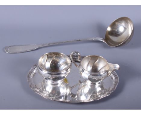 A Continental 800 standard white metal cream jug and sugar bowl, a similar oval tray and a 750 standard soup ladle