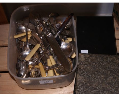 A collection of silver plated flatware