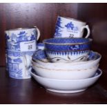 A group of early 19th century English blue and white coffee cans and saucers, various, including