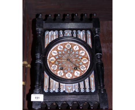 A late 19th century ebonised and decorated mantel clock, Gothic design with eight-day striking movement, 16" high